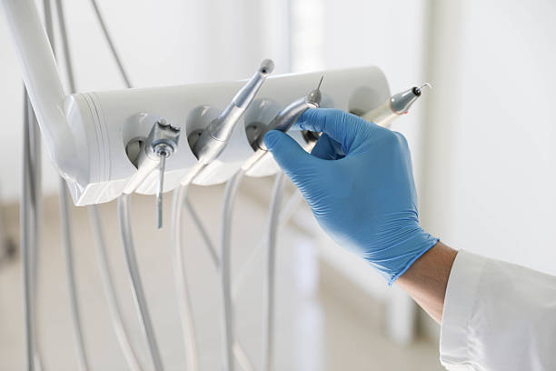Professional Wisdom Tooth Removal technician working in Wesson, MS